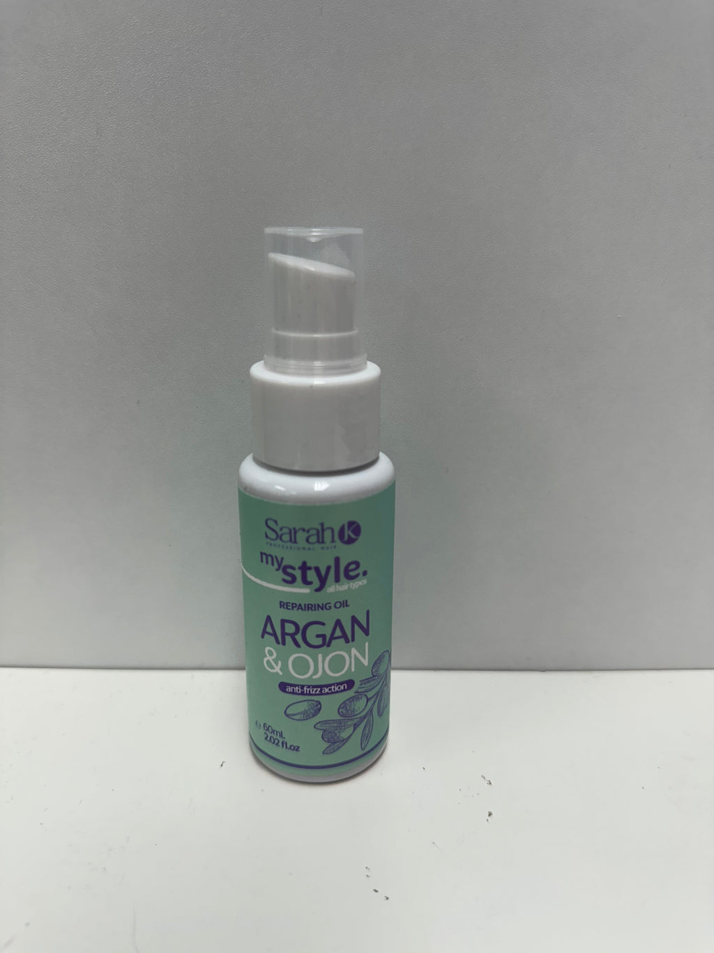 Sarah K My Style Argan & Ojon Repairing Oil 60ml white pump bottle with mint green label