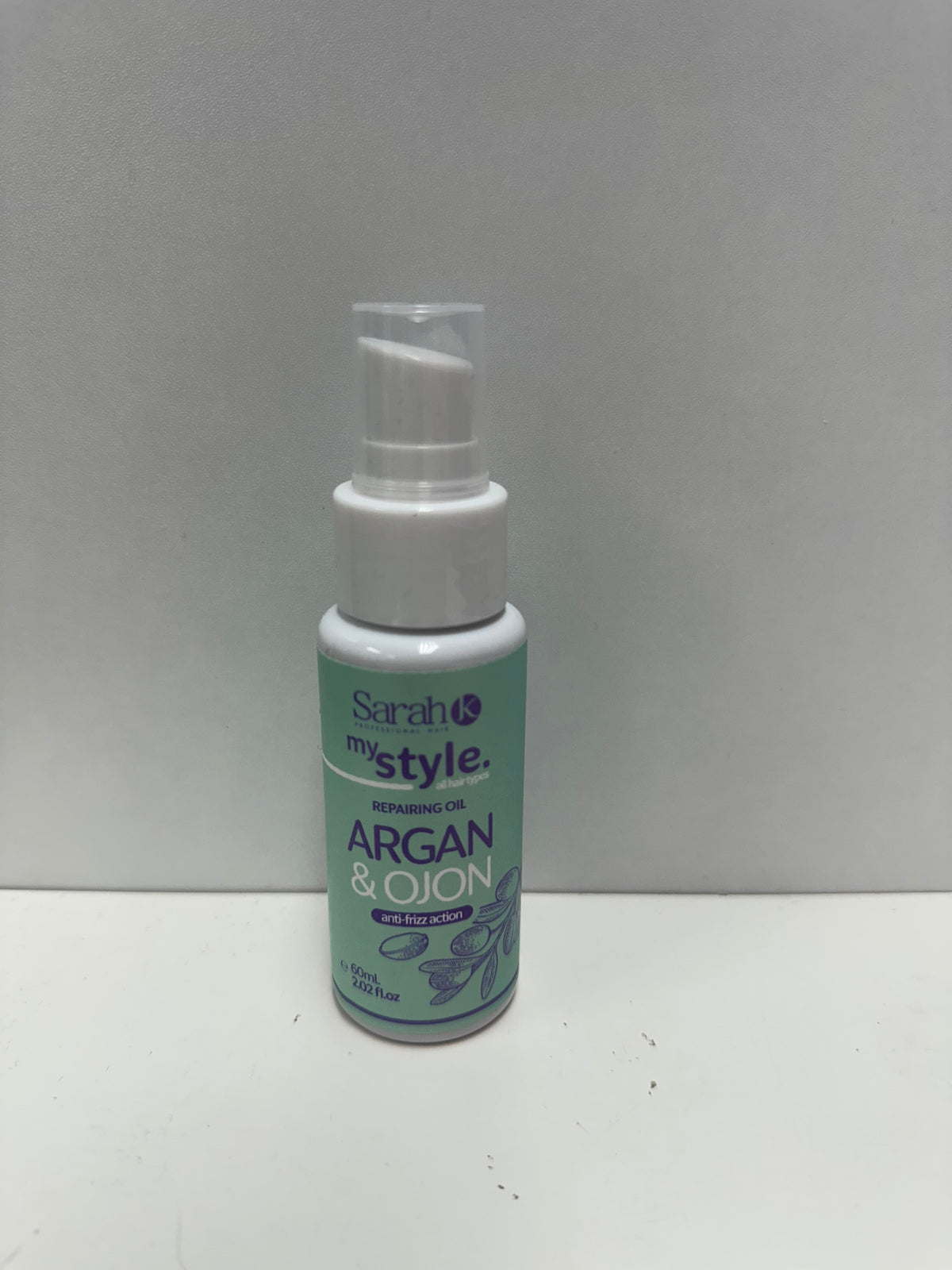 Sarah K My Style Argan & Ojon Repairing Oil 60ml white pump bottle with mint green label