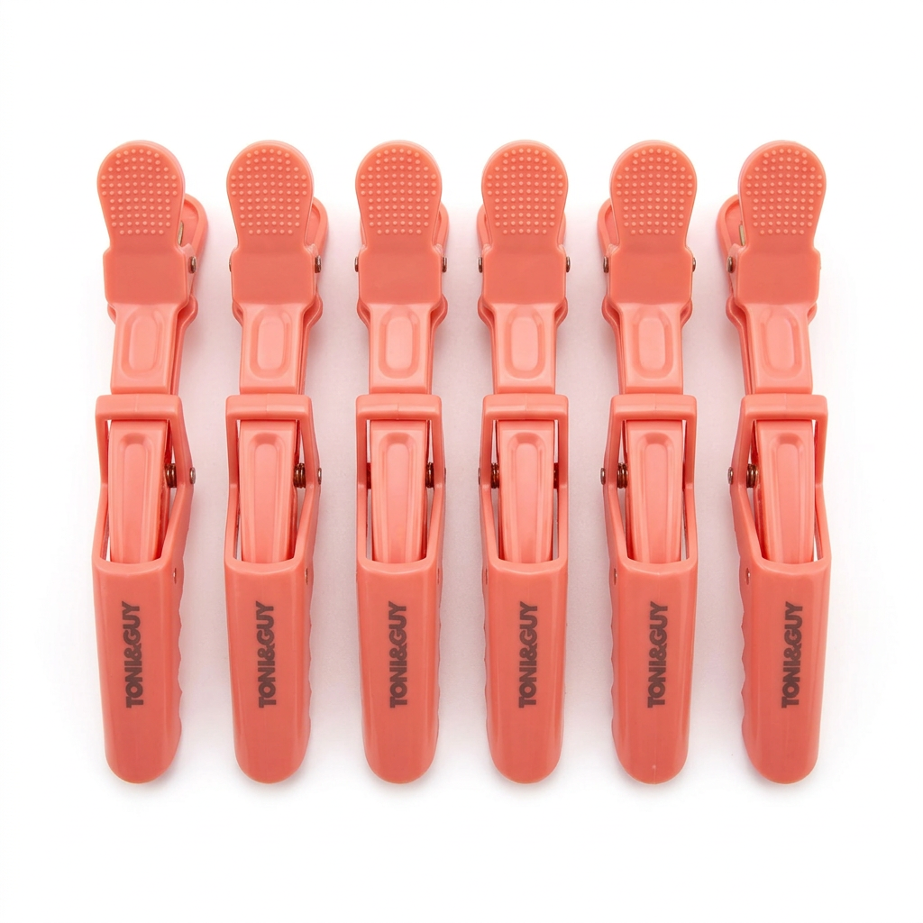 Coral crocodile sectioning clips on white