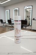 Sarah K La Vie en Rose Shampoo on salon marble countertop